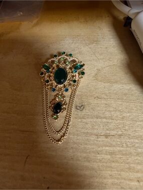 Gold-Tone Brooch with Deep Green Gem Accents